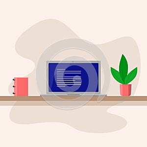 Laptop on a shelf with a notepad and plants