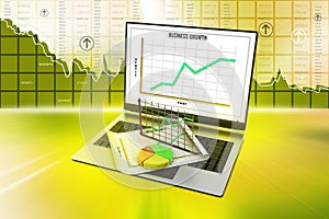 Laptop showing a spreadsheet and a paper with statistic charts