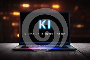 Laptop showing text in German: KI, kÃ¼nstliche Intelligenz - Generative AI photo