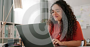 Laptop, smile and design with a woman in a small business office working on an artistic project. Creative, computer and