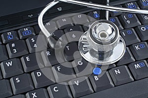 Laptop and stethoscope