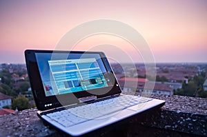 Laptop at sunset