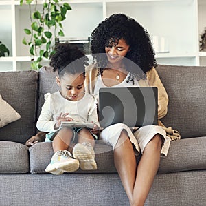 Laptop, tablet and black family online for learning, remote work or education in home living room. Woman or mother and