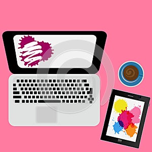 Laptop and tablet on a color background