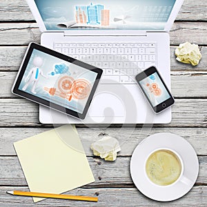 Laptop, tablet pc, smartphone and coffee cup