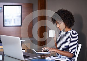 Laptop, tablet and woman with coffee for work from home opportunity, freelancer career and multimedia planning. African