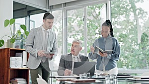 Laptop, training and a senior manager with his team in the boardroom for coaching during a workshop. Computer