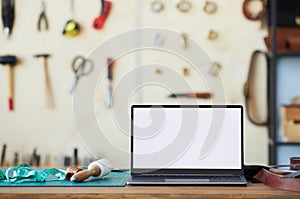 Laptop in Workshop Background photo