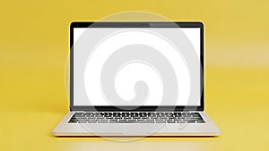 Laptop on yellow background, front view