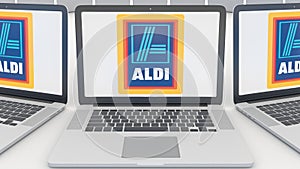 Laptops with Aldi logo on the screen. Computer technology conceptual editorial 3D rendering