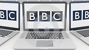 Laptops with British Broadcasting Corporation BBC logo on the screen. Computer technology conceptual editorial 3D