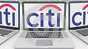 Laptops with Citigroup logo on the screen. Computer technology conceptual editorial 3D rendering