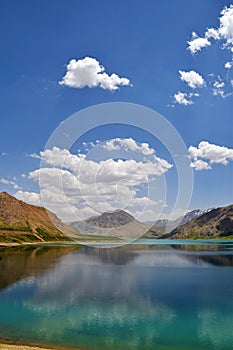 Lar Dam Lake and mountain with clouds in blue sky