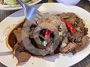 Larb beef liver or beef liver in spicy salad.