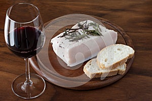 Lardo, bread and red wine