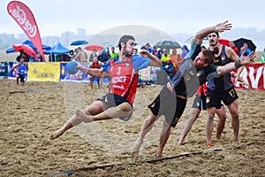 LAREDO, SPAIN - JULY 30: Unidentified player launches to goal in the Spain handball Championship celebrated in the beach of Laredo