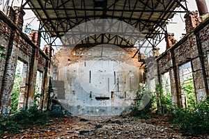 Large abandoned warehouse in Efremov factory, broken brick walls