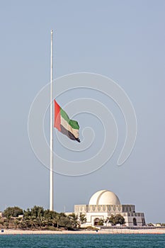 The Large Abu Dhabi flag flying at half-mast