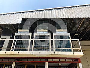 Large air conditioner compressors located outside a passenger terminal