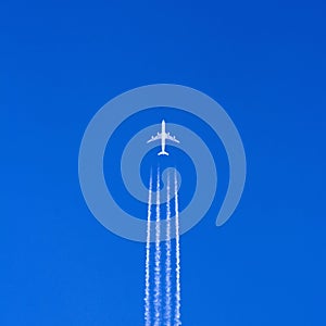 Large airplane in blue sky