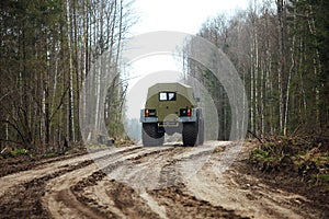 Large all-wheel drive all-terrain vehicle in the forest