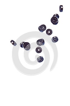 Large Amount of Ball Bearings Falling in Bulk Isolated Over White Background