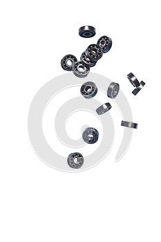 Large Amount of Ball Bearings Shaped and Formed In Free Fall Bulk. Isolated Over White Background