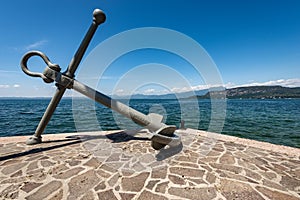 Large Anchor in front of the Port of Bardolino village on Lake Garda - Veneto Italy