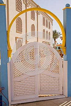 Large arabic door near the building