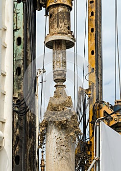 Large auger or drill creating foundations for apartments in Dubai