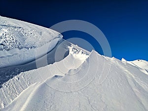 large avalanche crack edge. gliding snow avalanches. avalanche in winter. Davos