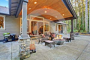 Large back yard with grass.