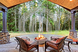 Large back yard with grass.