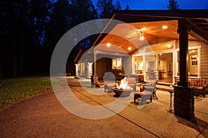 Large back yard with grass.