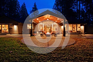 Large back yard with grass.