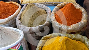 Large bags of ground spices at the spice market of chandni chowk in old delhi