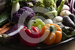 Large baking pan with fresh mixed colourful vegetables