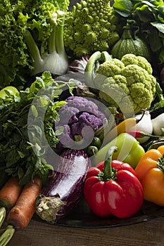 Large baking pan with fresh mixed colourful vegetables