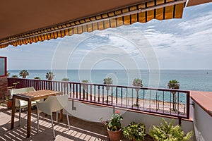 Large balcony covered with canopy on Vilassar de Mar waterfront photo