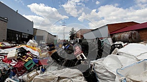 Large bales of compressed plastic bags