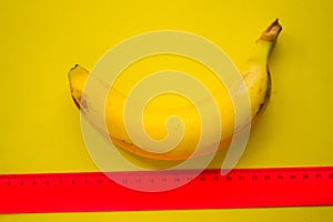 Large banana and measuring tape