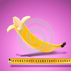 Large banana and measuring tape