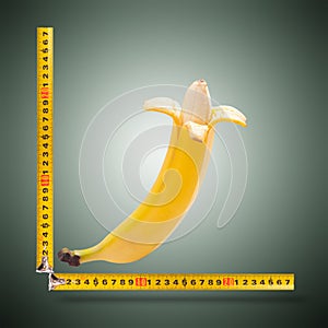 Large banana and measuring tape