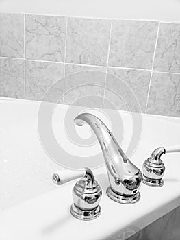 Large bath tub faucet black and white