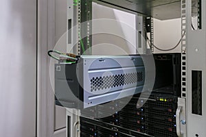 Large battery close-up. Changing the power module in the server room close-up. Working with equipment in the datacenter rack