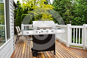 Large BBQ Grill on Wooden Deck