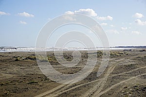 Large beach and stormy sea