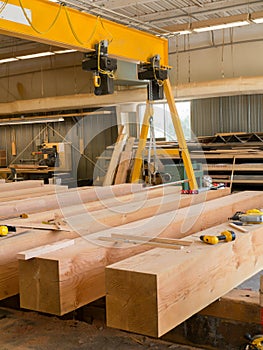 Large beams of wood in workshop