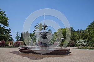 Large beautiful fountain among the trees