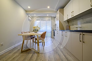 Large beige and cream luxury kitchen interior